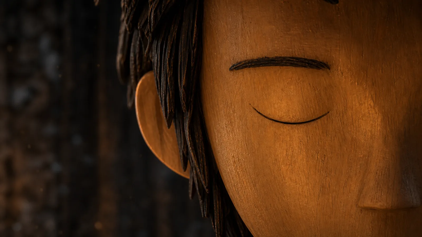 Extreme close-up — single eye remains closed in meditation